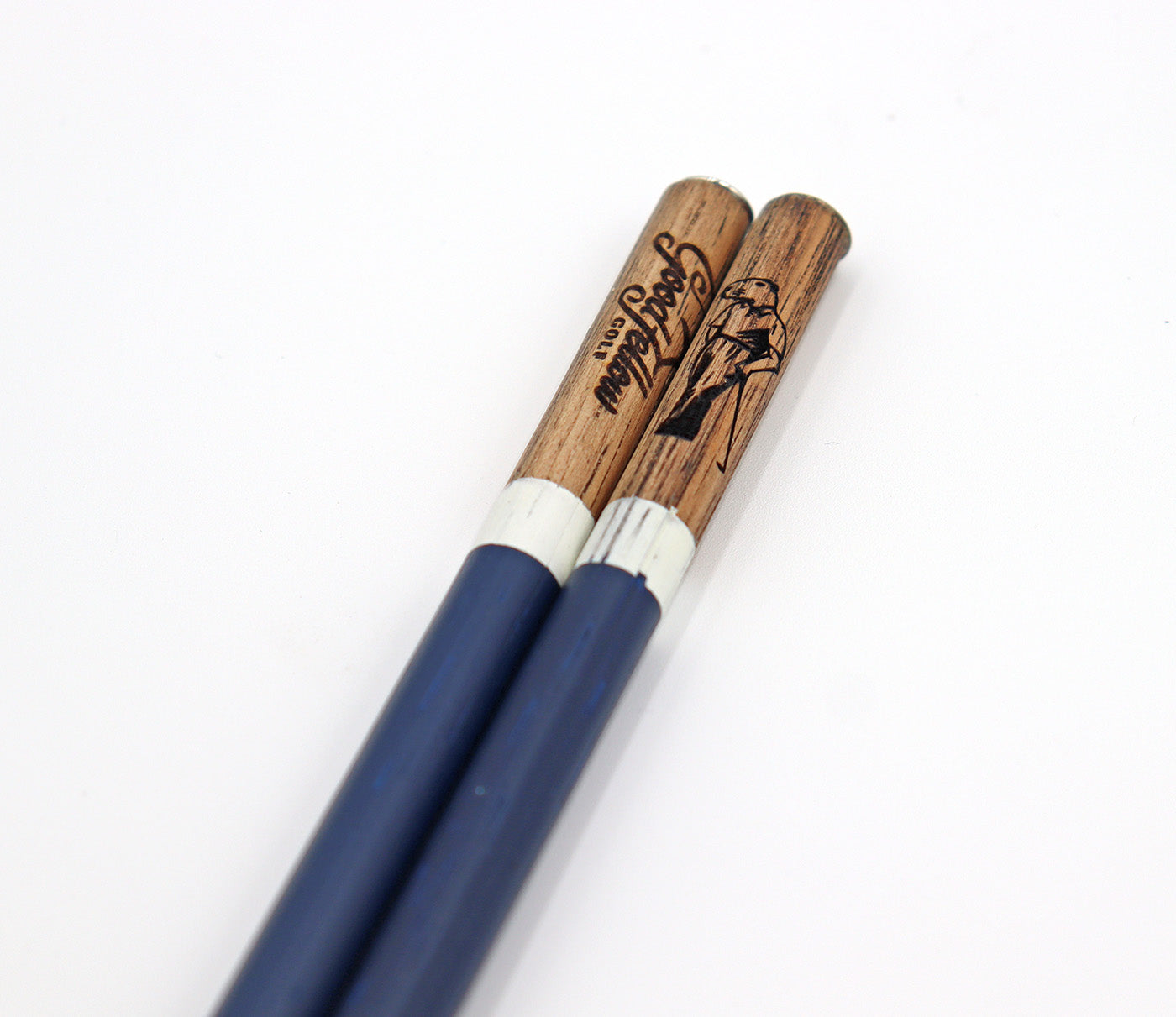 Close up product image of handcrafted hickory golf alignment sticks with custom Good Fellow Golf logos.