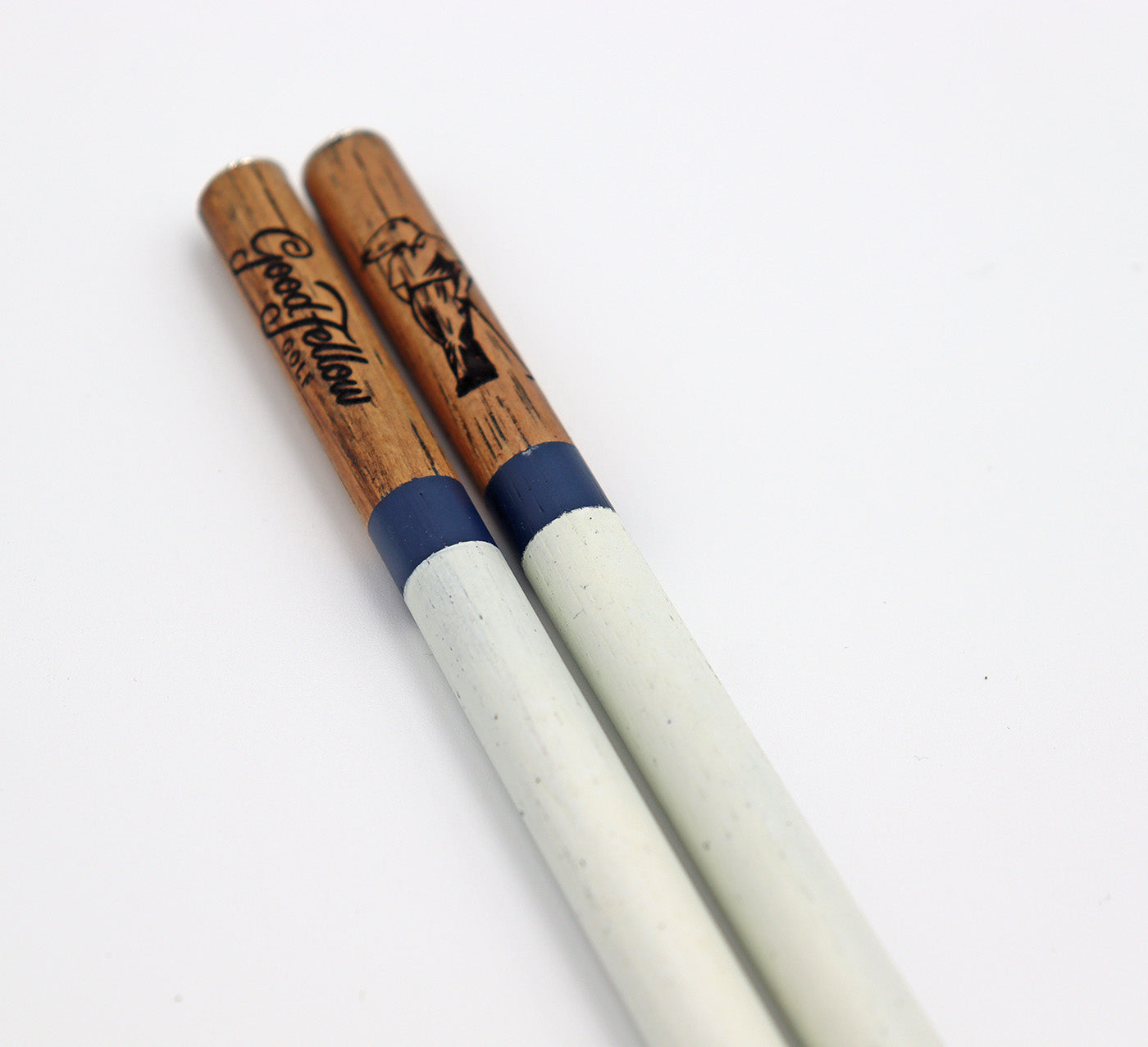 Close up product image of handcrafted hickory golf alignment sticks with custom Good Fellow Golf logos.