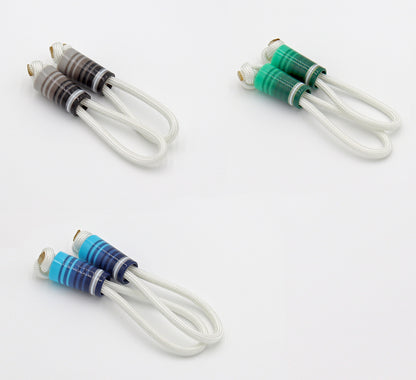 Close up detail image of Good Fellow Golf’s striped ferrules on zipper pull loops in blue, green and grey.