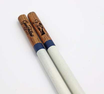 Close up product image of handcrafted hickory golf alignment sticks with custom Good Fellow Golf logos.